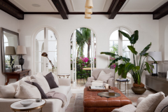 windows, plants, arched doors, beam ceilings, white sofa, add color, living room, cocktail ottoman